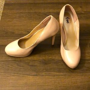 Glossy nude pink high heels